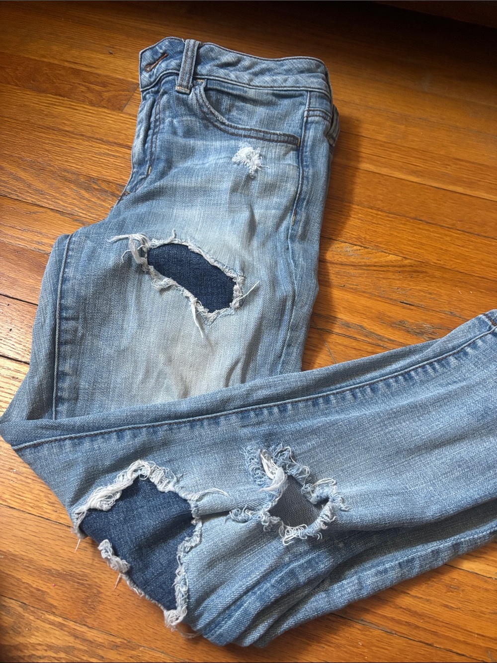 American Eagle Outfitters Faded Light Blue Ripped Skinny Jeans
